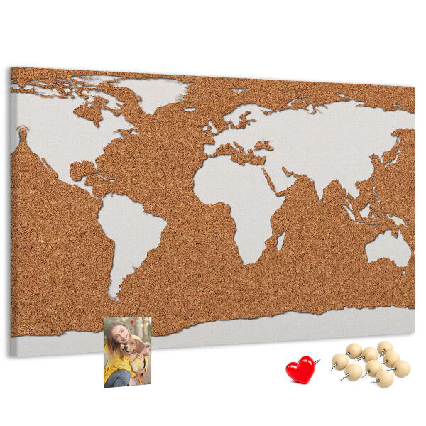 Nástěnka Mapa světa z korku připnutá na špendlík.