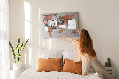 Nástěnka Mapa světa proti cihlové zdi
