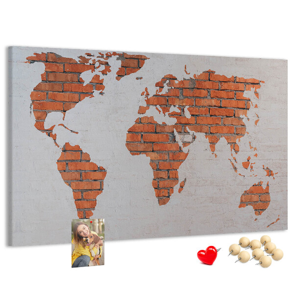Nástěnka Mapa světa proti cihlové zdi