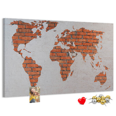 Nástěnka Mapa světa proti cihlové zdi